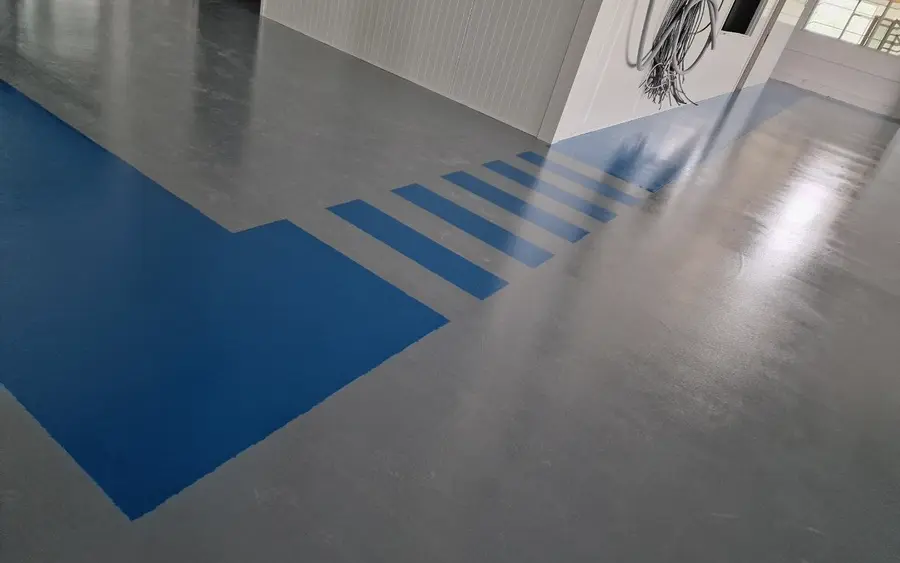 Finished resin floor with marked walkways